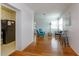 Open concept living room with hardwood floors connecting to kitchen, perfect for entertaining and Gathering gatherings at 476 Zelda Blvd, Daytona Beach, FL 32118