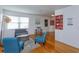 Bright and airy living room with hardwood floors, ample natural light, and built-in shelving for storage and display at 476 Zelda Blvd, Daytona Beach, FL 32118