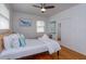 Serene main bedroom with hardwood floors, ample closet space, and a minimalist design for restful nights at 476 Zelda Blvd, Daytona Beach, FL 32118