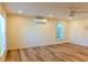 Large bedroom with light hardwood floors, recessed lighting and ceiling fan at 5108 Sunrise Blvd, Orlando, FL 32803
