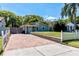 Charming home with beautiful brick driveway, manicured lawn, and lush landscaping at 5108 Sunrise Blvd, Orlando, FL 32803