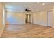 Spacious living room featuring wood floors and a ceiling fan at 5108 Sunrise Blvd, Orlando, FL 32803