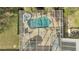 Aerial view displays a stunning pool, hot tub, gazebo, and outdoor space at 5170 Ne 64Th Ave, Silver Springs, FL 34488