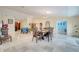 Bright dining space showcasing tile flooring and traditional-style furniture at 5170 Ne 64Th Ave, Silver Springs, FL 34488