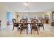 Dining space featuring decorative chandelier, formal furniture, and tile flooring at 5170 Ne 64Th Ave, Silver Springs, FL 34488