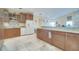 Spacious kitchen features granite countertops, lots of storage, and modern appliances at 5170 Ne 64Th Ave, Silver Springs, FL 34488