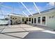 Open patio features a grill, a sink, and lots of room to entertain at 5170 Ne 64Th Ave, Silver Springs, FL 34488