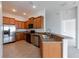 Well-equipped kitchen featuring stainless steel appliances and functional design at 6612 S Goldenrod Rd # 104A, Orlando, FL 32822