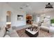 Staged living room showcasing an open floor plan with modern furnishings and decor at 6612 S Goldenrod Rd # 104A, Orlando, FL 32822