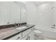 Clean bathroom featuring a shower and bathtub combination with a vanity at 8007 Colby Cir, Orlando, FL 32817