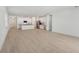 Open-concept floor plan showcasing a combined living space and modern kitchen at 8007 Colby Cir, Orlando, FL 32817