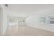 Bright living room with large windows and sliding glass doors at 8007 Colby Cir, Orlando, FL 32817