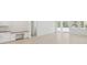 Open concept living room with modern flooring and abundant natural light at 8007 Colby Cir, Orlando, FL 32817
