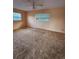 Cozy bedroom with neutral walls, carpeted floor, and natural light from windows at 805 Glen Arden Way, Altamonte Springs, FL 32701