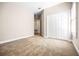 Bedroom featuring neutral walls and carpet, two closets and natural light at 8426 Foxworth Cir # 44, Orlando, FL 32819