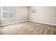 Bedroom featuring neutral walls and carpet, white trim, and natural light at 8426 Foxworth Cir # 44, Orlando, FL 32819