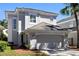 Charming two-story home with manicured lawn and a two car garage at 8426 Foxworth Cir # 44, Orlando, FL 32819