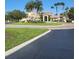The community is well-manicured with landscaping, palm trees, and attractive buildings at 8763 Worldquest Blvd # 5103, Orlando, FL 32821