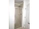 This bathroom shower features a glass door and modern shower head at 8763 Worldquest Blvd # 5103, Orlando, FL 32821