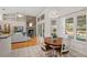 Open floor plan with dining area flowing into the living room and kitchen creates a seamless living space at 907 Almond Tree Cir, Orlando, FL 32835