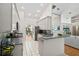 Well-equipped kitchen features granite countertops, stainless steel appliances, and ample cabinet space for storage at 907 Almond Tree Cir, Orlando, FL 32835