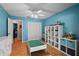 Large playroom featuring laminate floors, lots of storage, and plenty of natural light at 907 Almond Tree Cir, Orlando, FL 32835