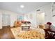 Bright living room with hardwood floors, a decorative rug, and comfortable seating arrangement at 908 Cannes Pl, Orlando, FL 32808