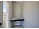 Bright office nook featuring built-in desk space and open doorway to the outside at 9314 Bolshoi Aly, Winter Garden, FL 34787