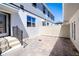 Enclosed patio with brick pavers and a privacy fence at 9314 Bolshoi Aly, Winter Garden, FL 34787