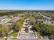 Welcome to a beautiful neighborhood entrance featuring manicured landscaping and a welcoming atmosphere at 9661 Portofino Dr, Orlando, FL 32832