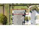 Aerial view of the home showcasing the backyard and surrounding landscape at 10849 Wyne Tree Ct, Orlando, FL 32824