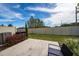 Well-maintained backyard with a patio and a privacy fence surrounded by landscaping at 10849 Wyne Tree Ct, Orlando, FL 32824