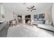 Open-concept living space with a spacious kitchen, dining area, and comfortable living room at 10849 Wyne Tree Ct, Orlando, FL 32824