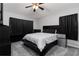 Cozy bedroom with plush carpeting, a sleek ceiling fan, and ample storage space at 10876 Eclipse Lily Way # 60, Orlando, FL 32832