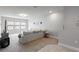 Comfortable living room area with gray sofa and carpet at 1284 Spotted Sandpiper Loop, Winter Springs, FL 32708