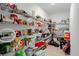 Well-stocked pantry with ample shelving and plenty of storage space for all your culinary needs at 1284 Spotted Sandpiper Loop, Winter Springs, FL 32708