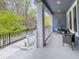 Relaxing porch with hanging chair, providing ample space for outdoor seating at 1284 Spotted Sandpiper Loop, Winter Springs, FL 32708