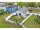 Aerial view of a fenced backyard with a patio and garden, offering privacy and a delightful outdoor space at 13212 Briar Forest Ct, Orlando, FL 32828