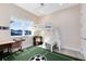 Nicely decorated bedroom featuring a loft bed, playful soccer rug and desk at 13800 Chauvin Ave, Orlando, FL 32827