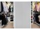 Well-organized walk-in closet with shelving and hanging space for clothes and accessories at 13800 Chauvin Ave, Orlando, FL 32827