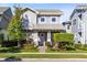 Charming two-story home with a well-manicured lawn and inviting front entrance at 13800 Chauvin Ave, Orlando, FL 32827