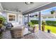 Covered patio offers plenty of seating space, perfect for entertaining at 13800 Chauvin Ave, Orlando, FL 32827