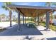 Outdoor pavilion offers picnic tables and shade for gatherings next to the lawn at 13800 Chauvin Ave, Orlando, FL 32827