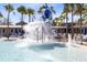 Zero entry pool area with splash pad features and seating providing a fun space for all ages at 13800 Chauvin Ave, Orlando, FL 32827