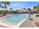 Resort-style pool features shallow entry, playful fountains, and lounge chairs for a relaxing experience at 13800 Chauvin Ave, Orlando, FL 32827