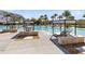 Luxurious resort-style pool with lounge chairs and cabanas for a tranquil retreat at 13800 Chauvin Ave, Orlando, FL 32827