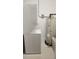 Stackable washer and dryer with a hot water heater for in-unit laundry convenience at 150 E Robinson St # 12A-15 / 1216, Orlando, FL 32801