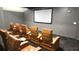 Community movie theater with comfortable seating and a large screen at 150 E Robinson St # 12A-15 / 1216, Orlando, FL 32801