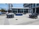 Gather with friends on the rooftop deck, equipped with dining sets and beautiful landscaping at 150 E Robinson St # 12A-15 / 1216, Orlando, FL 32801