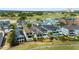 Gorgeous aerial view of a home and swimming pool, located on a golf course at 1543 Corolla Ct, Reunion, FL 34747